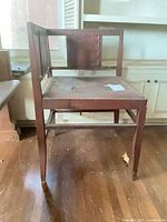 Front/side view of entire wooden chair