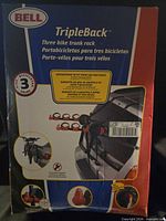 Front of Bell TripleBack rack box showing product image and three-bike capacity icon
