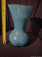 Full view of vase with measuring tape showing height