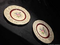 Two British Empire Ware plates front view showing design and condition