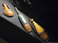 Front view of three chalkware plaques