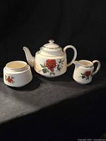 Teapot, creamer and open sugar bowl group shot