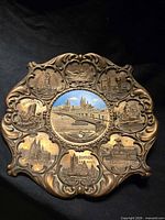 Front view of ornate West Germany copper-tone souvenir plate