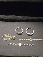 All five wristwatches laid out for overview