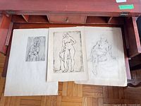 Three lithographs laid out: Madonna and Child, standing nude, seated nude