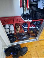 Closet view showing multiple pairs on crates