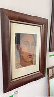 Framed portrait painting full view showing frame and mat