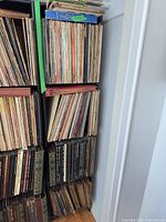 Two shelving columns filled with LPs and 78 RPM albums