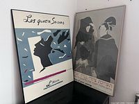 Both posters standing side by side showing overall condition and size comparison