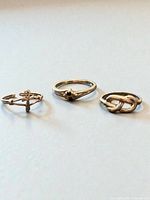 All three sterling silver rings side by side