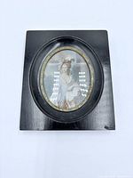 Front view of framed portrait