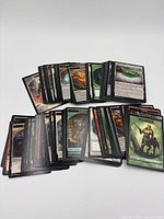 overview of stacked Magic The Gathering cards