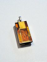 front view showing amber mosaic and silver frame