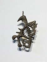 Front view of sterling silver abstract brutalist pendant with bail