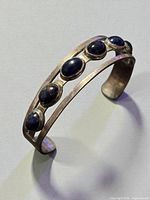 Front view of sterling silver cuff bracelet with sodalite cabochons