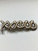 Front view showing XOXO script design