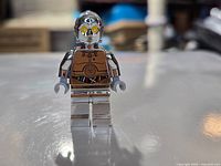 Front view of chrome TC-14 minifigure