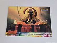 Front of Topps Pokémon card showing artwork and title strip