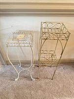 Square and rectangular metal plant stands side by side