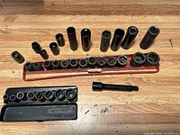 Group shot showing all sockets, rail, case and extension