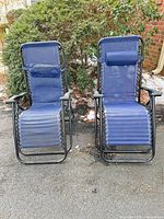 Front view of both blue zero-gravity chairs