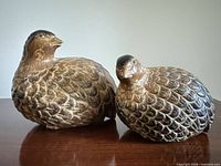 front view of both ceramic birds