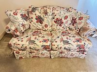 Front view of Pennsylvania House floral loveseat