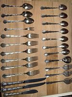 Full layout showing all 24 pieces on wood surface