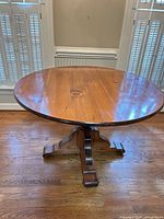 Full view of round wooden dining table