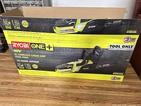 Retail box showing Ryobi ONE+ 18V 10-inch cordless chainsaw