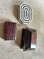 Three closed boxes showing exterior designs