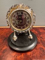 Front view showing dial, crystal bezel, base