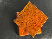 Top view of speckled lacquer lid stacked on second box