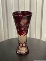 Front view showing overall shape, flared rim, floral cuts