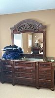 Full view of dresser with attached mirror
