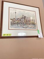 Full view of framed Toronto skyline print on wall