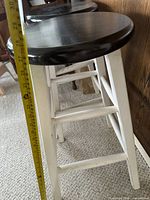 Side view of stools showing seat height measurement