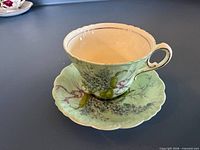 Paragon Lilac teacup on saucer showing exterior color and floral design