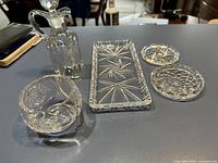 Full view of all five crystal pieces on countertop