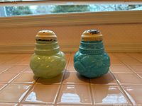 Front view of both Quilted Phlox shakers
