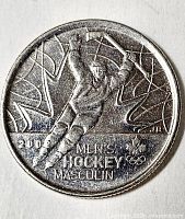 Full view of reverse side showing hockey player, date 2002 and inscriptions