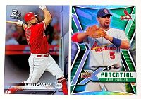 Fronts of both Albert Pujols baseball cards showing designs and serial number