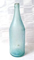 Full view of aqua glass bottle