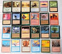 Front view of all 24 MTG cards laid out in four rows
