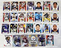 Front view of 24 of the stickers in grid plus 3 foil-style at bottom