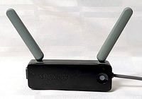 Front view showing Xbox 360 logo and twin antennas