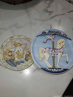 Both collector plates side by side on countertop