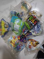 Group of all sealed toys showing variety of packaging