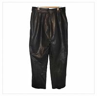 Front view of black leather pants showing overall design and condition