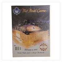 Front cover showing title, venue image, barcode, date, matchup, and limited edition logo
